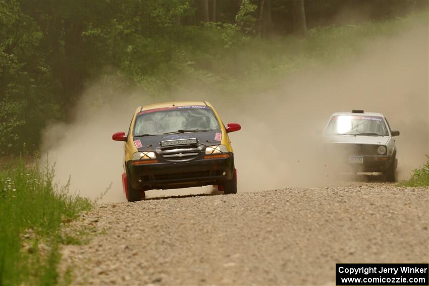 James Walker / Yannis Burnell Chevy Aveo and Josh Nykanen / Connor Himes VW GTI on SS1, Camp 3 North.