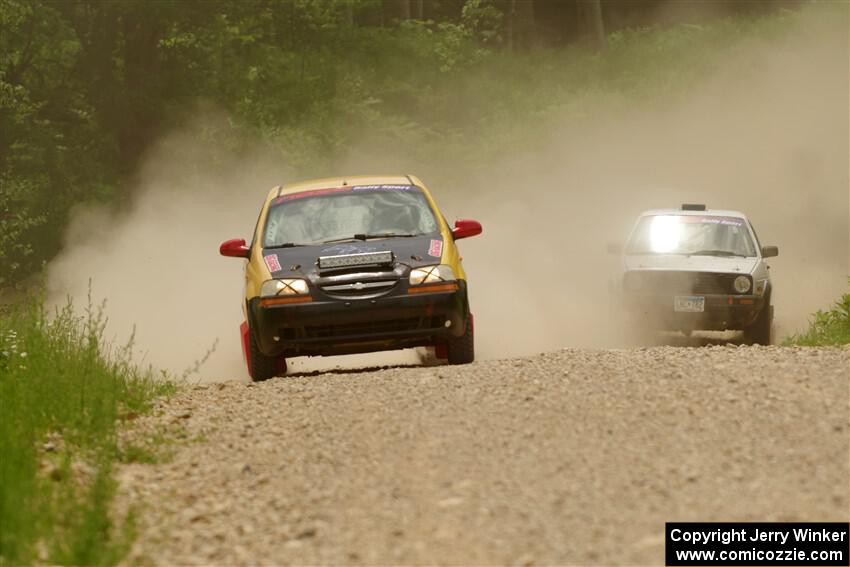 James Walker / Yannis Burnell Chevy Aveo and Josh Nykanen / Connor Himes VW GTI on SS1, Camp 3 North.