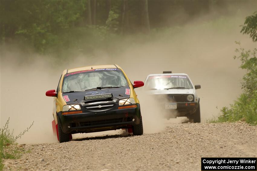 James Walker / Yannis Burnell Chevy Aveo and Josh Nykanen / Connor Himes VW GTI on SS1, Camp 3 North.