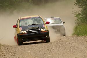 James Walker / Yannis Burnell Chevy Aveo and Josh Nykanen / Connor Himes VW GTI on SS1, Camp 3 North.