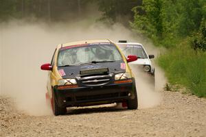 James Walker / Yannis Burnell Chevy Aveo and Josh Nykanen / Connor Himes VW GTI on SS1, Camp 3 North.