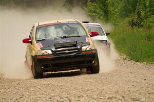 James Walker / Yannis Burnell Chevy Aveo and Josh Nykanen / Connor Himes VW GTI on SS1, Camp 3 North.