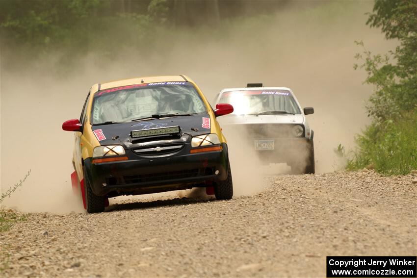 James Walker / Yannis Burnell Chevy Aveo and Josh Nykanen / Connor Himes VW GTI on SS1, Camp 3 North.