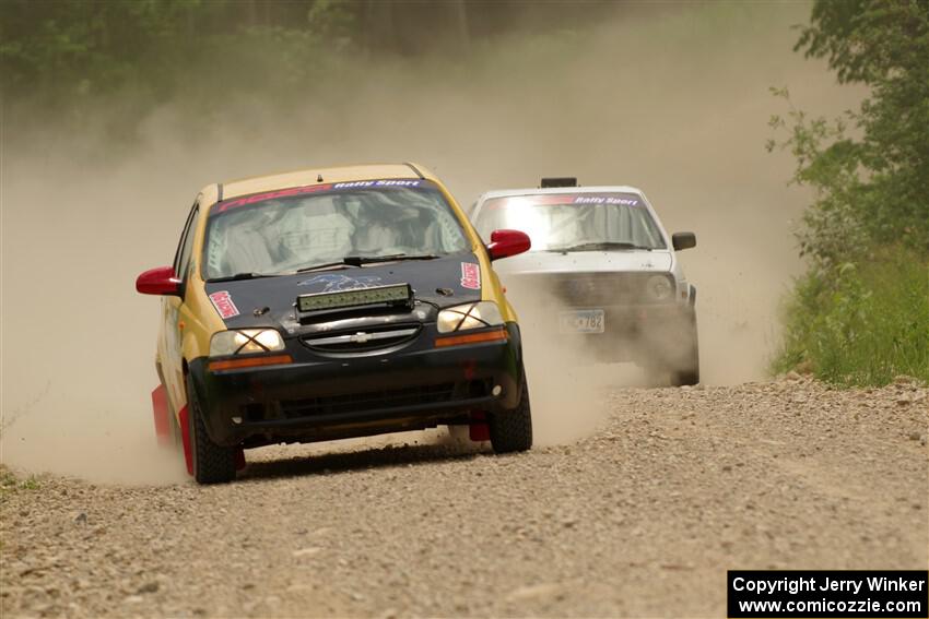 James Walker / Yannis Burnell Chevy Aveo and Josh Nykanen / Connor Himes VW GTI on SS1, Camp 3 North.