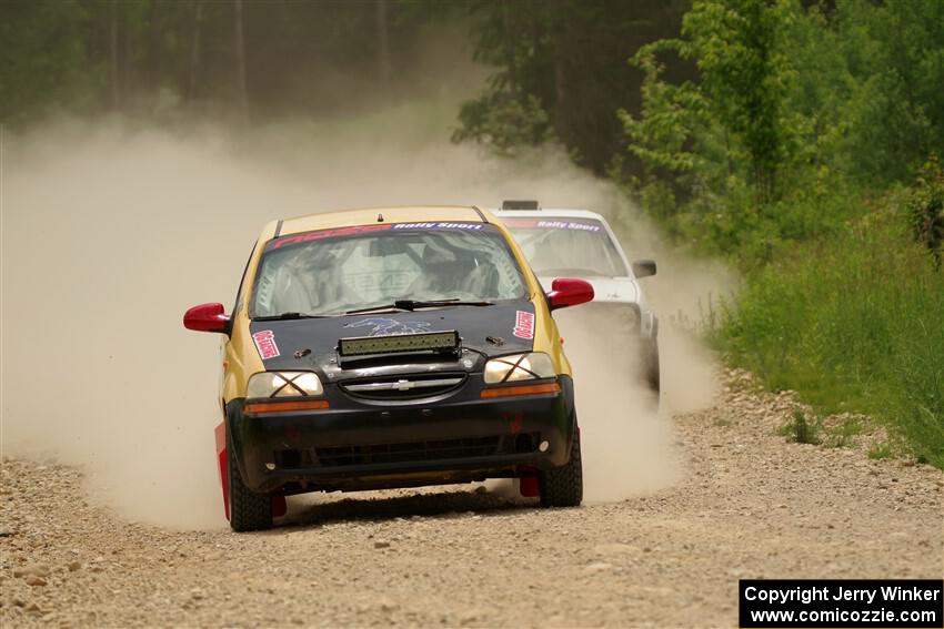 James Walker / Yannis Burnell Chevy Aveo and Josh Nykanen / Connor Himes VW GTI on SS1, Camp 3 North.