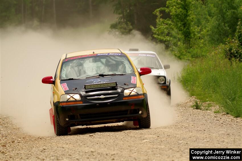 James Walker / Yannis Burnell Chevy Aveo and Josh Nykanen / Connor Himes VW GTI on SS1, Camp 3 North.