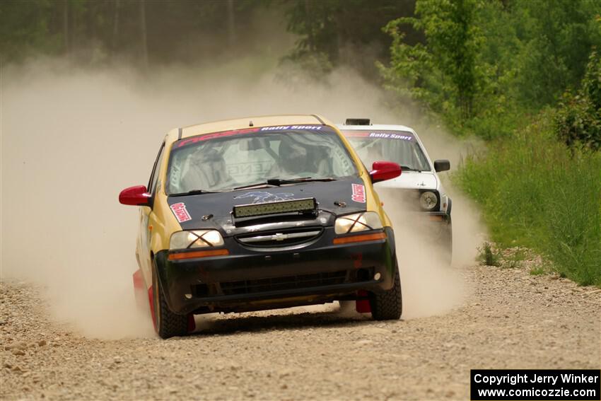 James Walker / Yannis Burnell Chevy Aveo and Josh Nykanen / Connor Himes VW GTI on SS1, Camp 3 North.