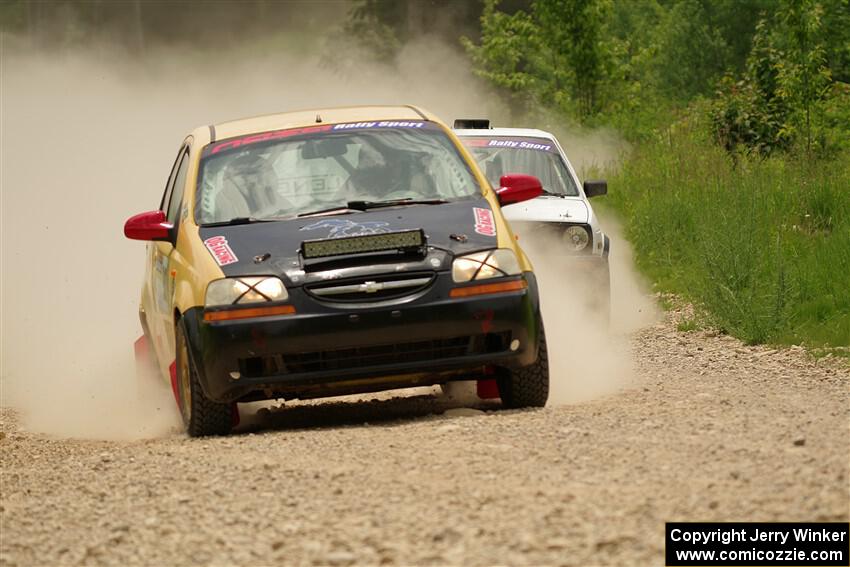 James Walker / Yannis Burnell Chevy Aveo and Josh Nykanen / Connor Himes VW GTI on SS1, Camp 3 North.