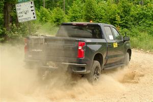 A Chevy Silverado pickup sweeps SS2, Skunk Creek.