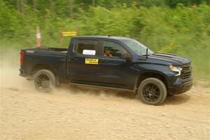 A Chevy Silverado pickup sweeps SS3, Woodtick Hollow.