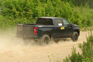 A Chevy Silverado pickup sweeps SS3, Woodtick Hollow.