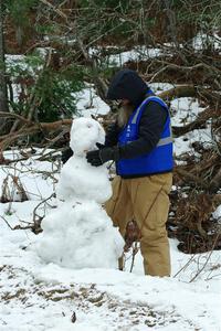 John Ruschmeyer builds a snowman before SS7, Hunters-McCormick Lake I.