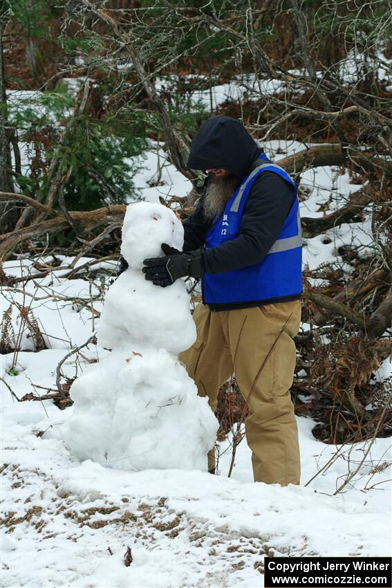 John Ruschmeyer builds a snowman before SS7, Hunters-McCormick Lake I.