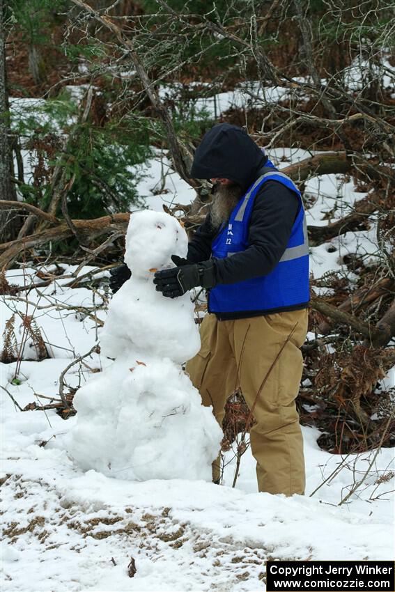 John Ruschmeyer builds a snowman before SS7, Hunters-McCormick Lake I.