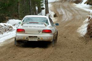 Andrew Williamson / Julia Stewart Subaru Impreza on SS7, Hunters-McCormick Lake I.