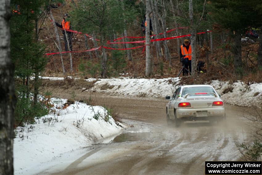 Andrew Williamson / Julia Stewart Subaru Impreza on SS7, Hunters-McCormick Lake I.