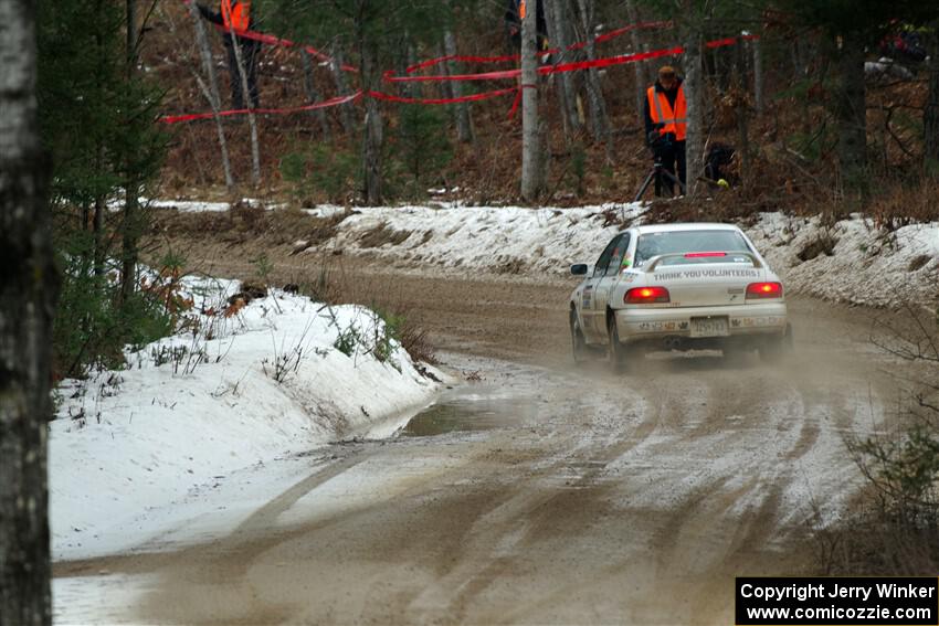 Andrew Williamson / Julia Stewart Subaru Impreza on SS7, Hunters-McCormick Lake I.