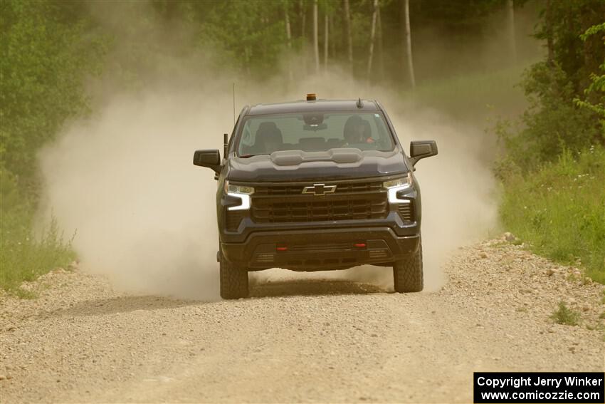 A Chevy Silverado pickup sweeps SS4, Hollow Woodtick.