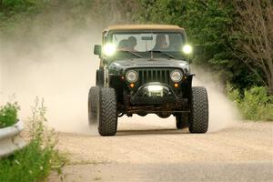 A Jeep Wrangler sweeps SS6, Camp 3 South.