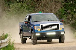 A Ford F-150 pickup sweeps SS6, Camp 3 South.