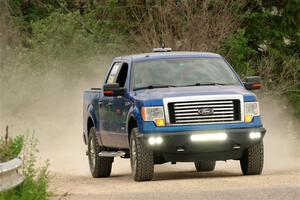 A Ford F-150 pickup sweeps SS6, Camp 3 South.