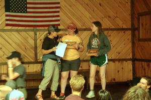 Lynn Wolf presents second in OAL class to Katie Gingras and Camille Carlson.