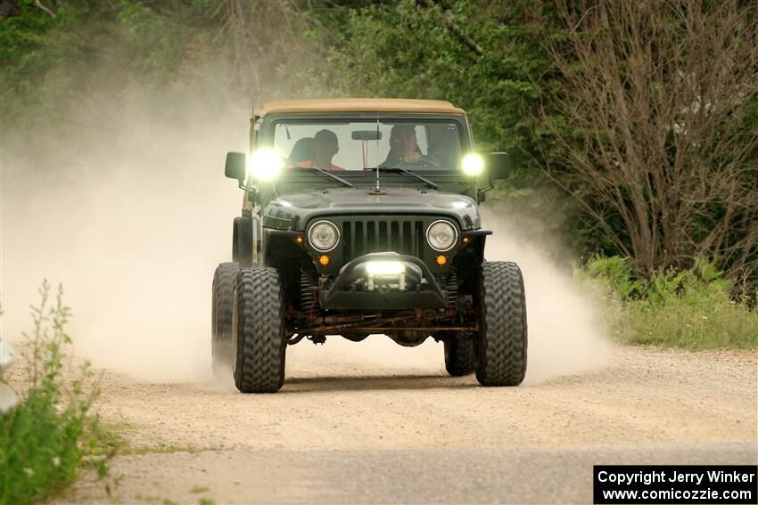 A Jeep Wrangler sweeps SS6, Camp 3 South.