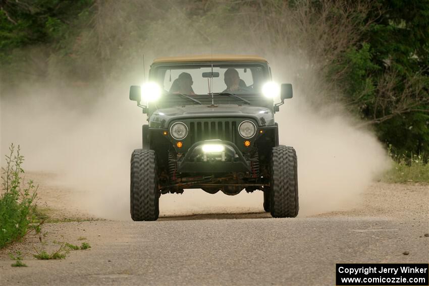 A Jeep Wrangler sweeps SS6, Camp 3 South.