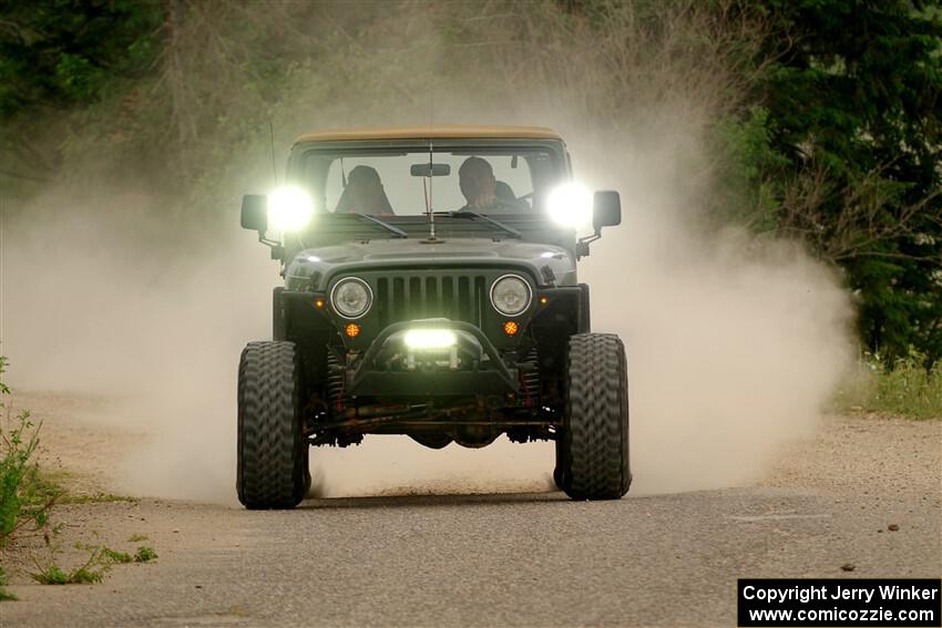 A Jeep Wrangler sweeps SS6, Camp 3 South.