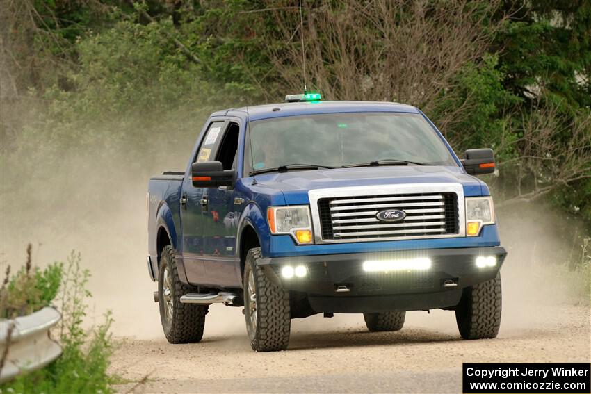 A Ford F-150 pickup sweeps SS6, Camp 3 South.