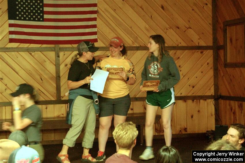 Lynn Wolf presents second in OAL class to Katie Gingras and Camille Carlson.