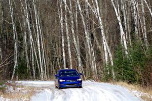 The '0' car, a Mitshibishi Lancer GTS, on SS1, Nemadji Trail East.