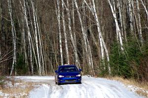 The '0' car, a Mitshibishi Lancer GTS, on SS1, Nemadji Trail East.