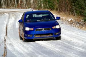 The '0' car, a Mitshibishi Lancer GTS, on SS1, Nemadji Trail East.