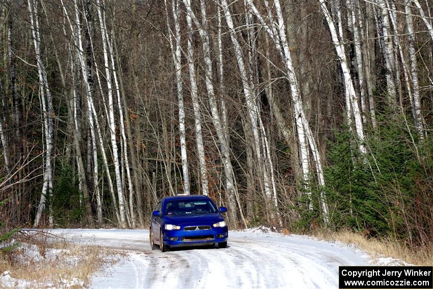 The '0' car, a Mitshibishi Lancer GTS, on SS1, Nemadji Trail East.