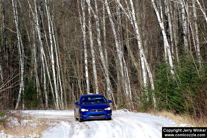 The '0' car, a Mitshibishi Lancer GTS, on SS1, Nemadji Trail East.