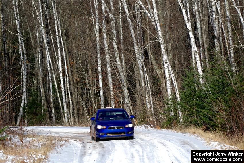 The '0' car, a Mitshibishi Lancer GTS, on SS1, Nemadji Trail East.