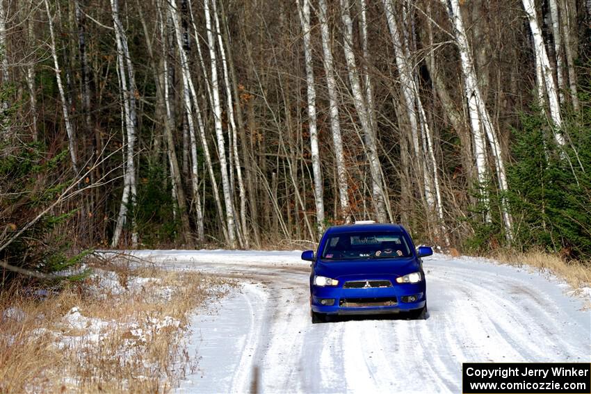 The '0' car, a Mitshibishi Lancer GTS, on SS1, Nemadji Trail East.