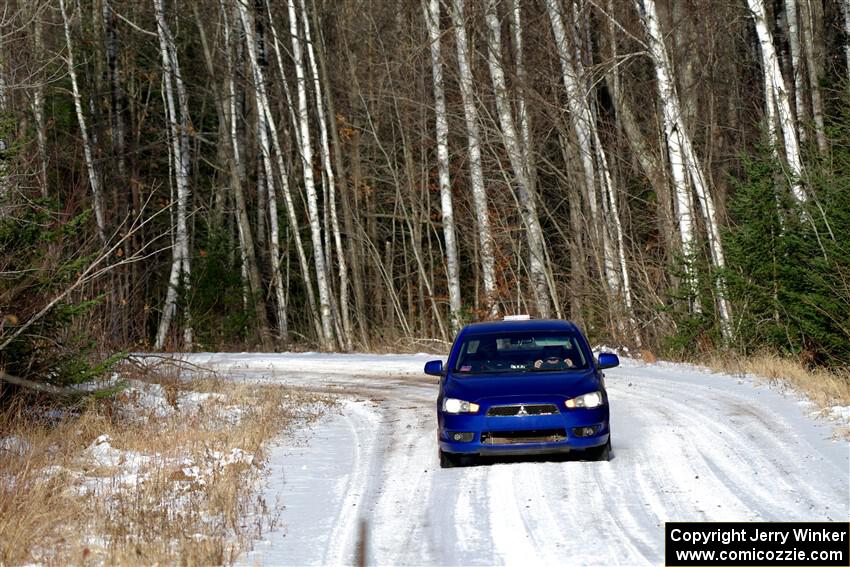 The '0' car, a Mitshibishi Lancer GTS, on SS1, Nemadji Trail East.