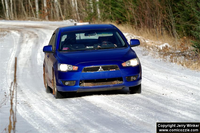 The '0' car, a Mitshibishi Lancer GTS, on SS1, Nemadji Trail East.