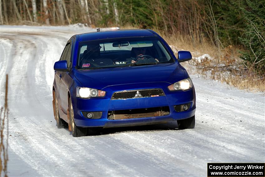 The '0' car, a Mitshibishi Lancer GTS, on SS1, Nemadji Trail East.