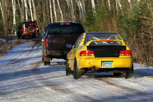 Steve Gingras / Katie Gingras Subaru Impreza is towed out of SS2, Nemadji Trail West, after DNF'ing.