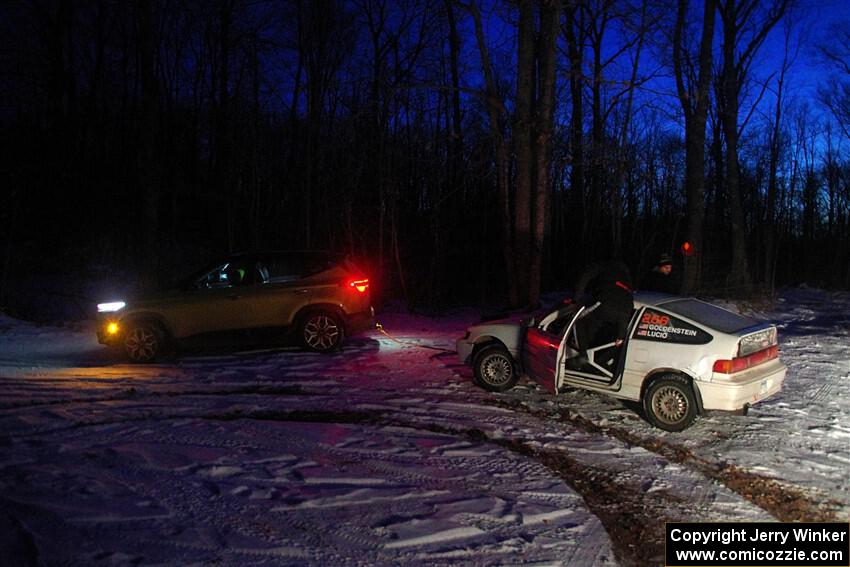 Peyton Goldenstein / Brent Lucio Honda CRX Si is pulled to a spot for pick up by John Ruschmeyer.