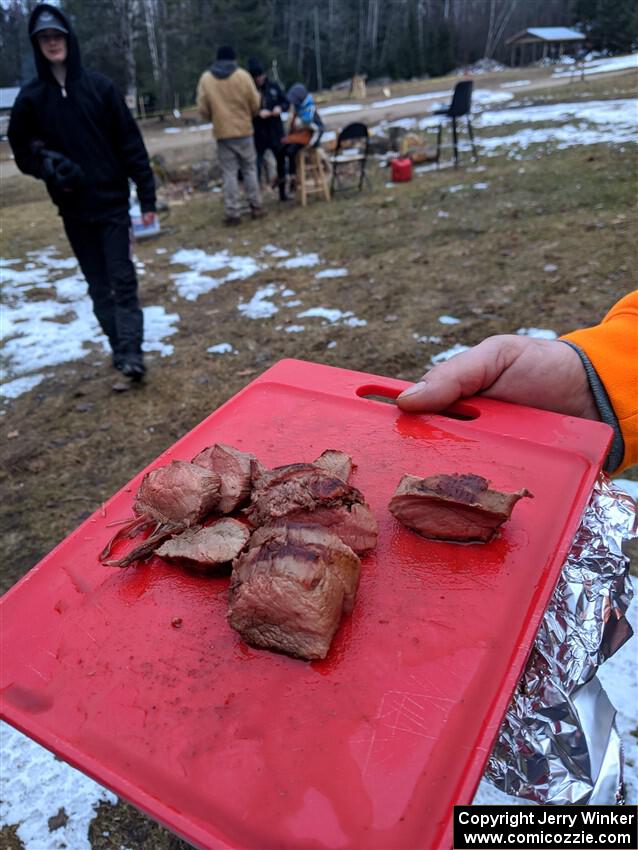 A neighbor hands out free cooked venison cutlets prior to Another bonfire is lit before SS14, Thunder River.