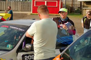 Kristen Tabor chats in front of the Madelyn Tabor / Sophia McKee Subaru Impreza 2.5RS at parc expose.