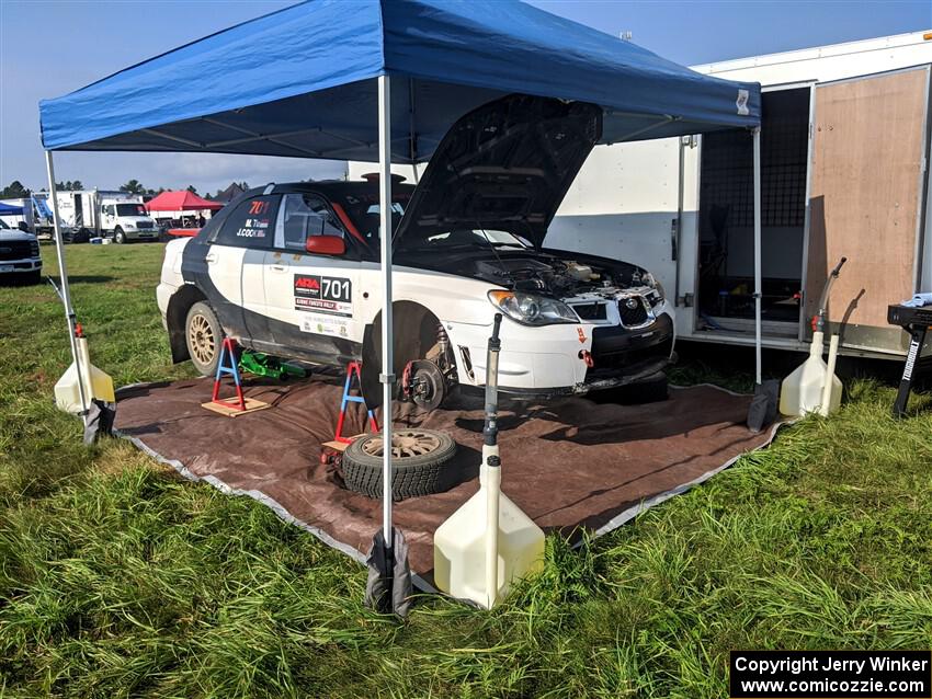 Jason Cook / Maggie Tu Subaru WRX before Friday's stages.