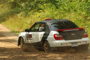 Jason Cook / Maggie Tu Subaru WRX on SS2, Thorpe Tower I.