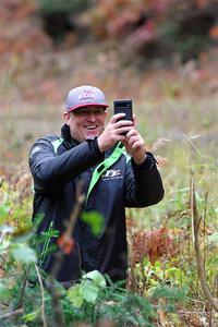 Cameron Steely takes pictures from the jump on SS10, Al's Playground II, after DNF'ing on the stage.