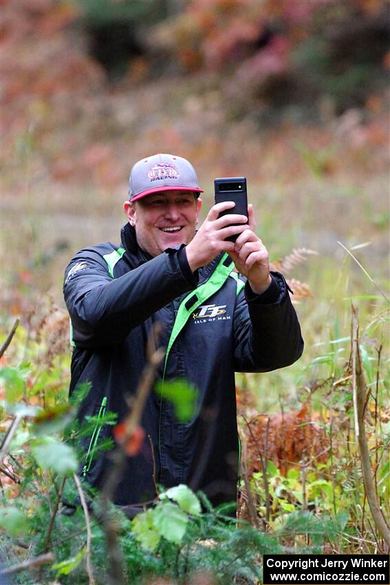 Cameron Steely takes pictures from the jump on SS10, Al's Playground II, after DNF'ing on the stage.