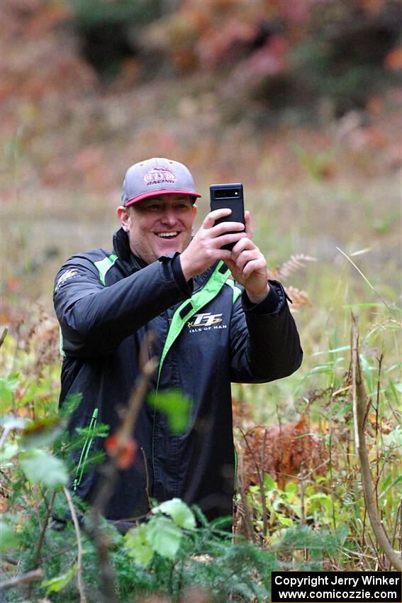 Cameron Steely takes pictures from the jump on SS10, Al's Playground II, after DNF'ing on the stage.